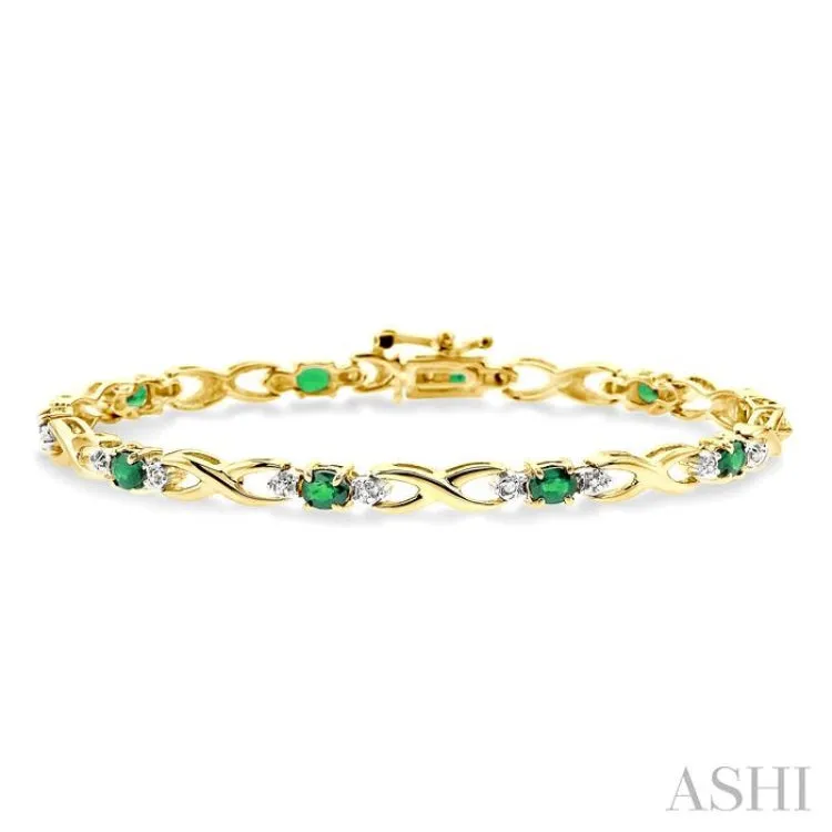 4x3mm Oval Cut Emerald and 1/10 Ctw Single Cut Diamond Bracelet in 14K Yellow Gold