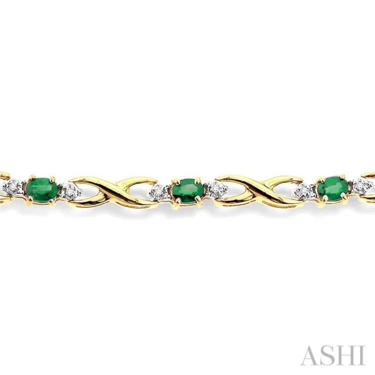 4x3mm Oval Cut Emerald and 1/10 Ctw Single Cut Diamond Bracelet in 14K Yellow Gold