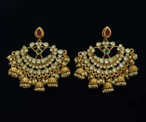 Gold plated chandbali with kundan and jhumkis.