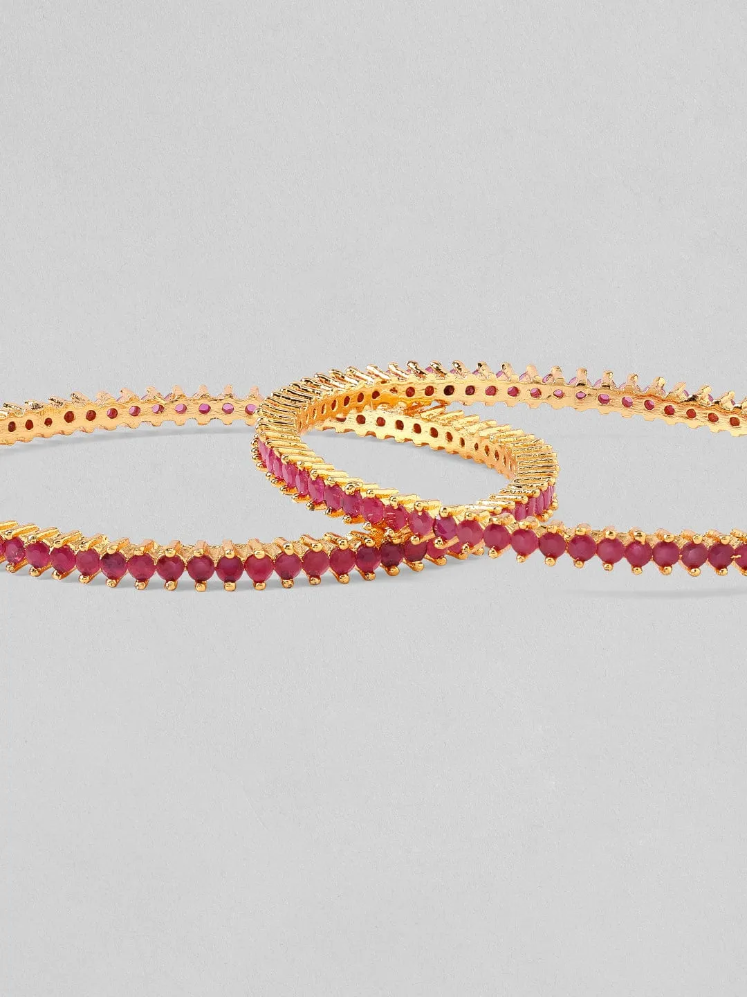 Rubans Set Of 4 Gold-Plated & Pink AD-Studded Bangles